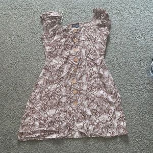 I am selling a snake button up maxi dress.